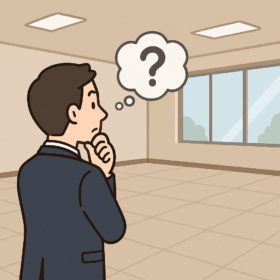 空間を見て考える男性